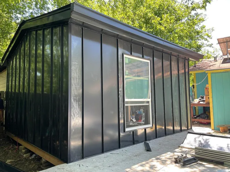 Black standing seam metal wall panels for Roof Inspection in Amsterdam