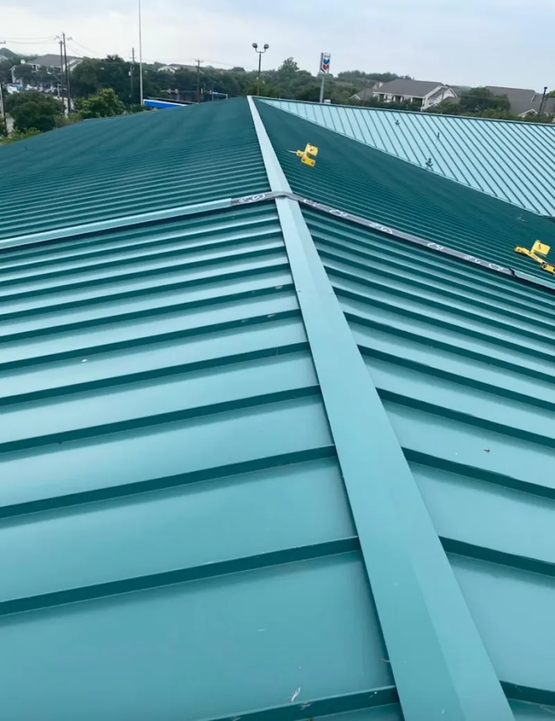 Green commercial metal roof ridge and valley for Metal Roof Repair in Amsterdam