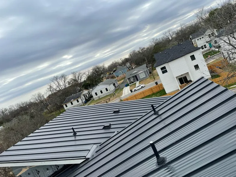 Standing seam metal roof panels with vents for Skylight Repair in Amsterdam